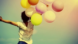 Woman happy with balloons